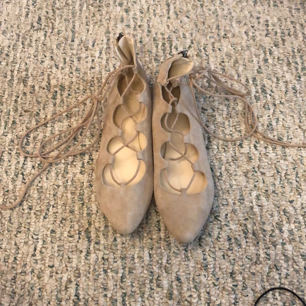Nude lace up flats